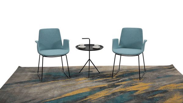 From our Flex line of furniture, two blue chairs with a coffee table between.